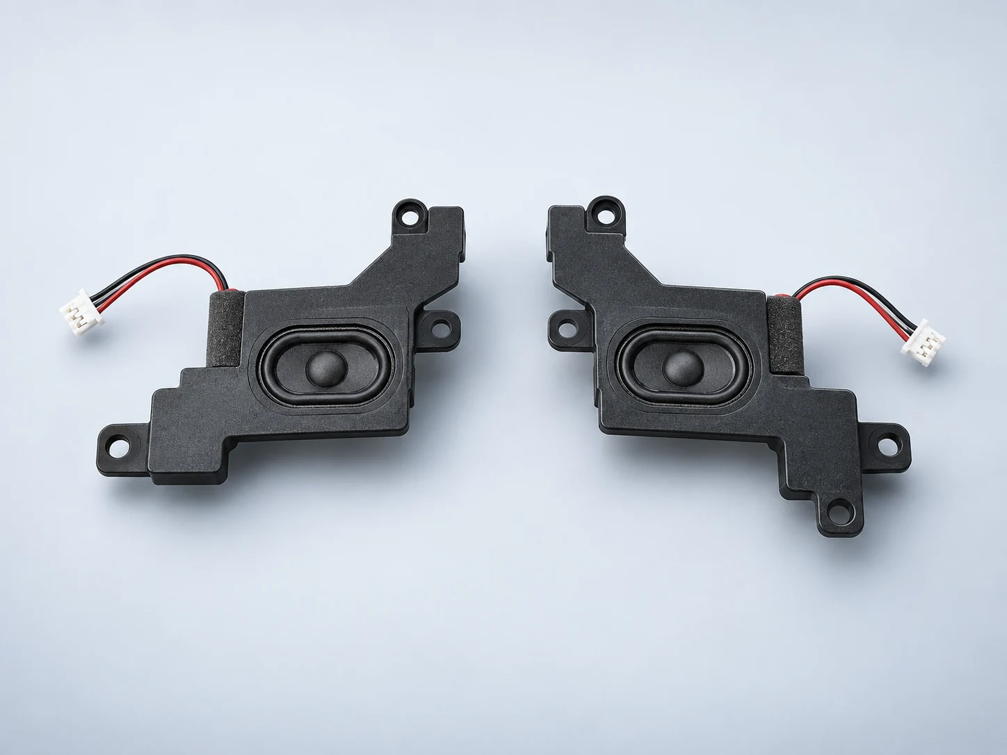Illustration of a pair of internal laptop speakers